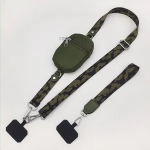 Detail view of the green tactical phone strap featuring a zippered pouch and camo sling.