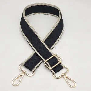 Correa de repuesto para bolso tejida en blanco y negro con herrajes dorados ajustables.
