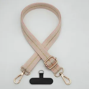 Tracolla per cellulare intrecciata rosa con hardware dorato e linguetta nera regolabile.
