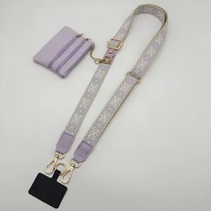 Violettes gewebtes Handyzusatzband mit kleine Münztasche und Metallbeschlägen, Detailansicht.