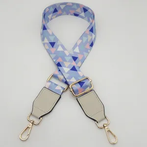 Geometric print bag replacement strap, adjustable shoulder strap with metal hardware.