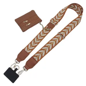 Wide embroidered leaf strap with detachable coin purse and phone lanyard crossbody accessory.