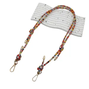 Colorful braided strap replacement for bags and phones with ethnic style design and metal clasps