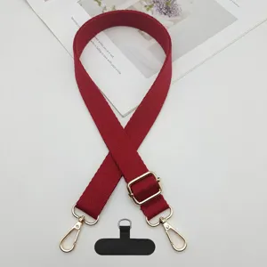 Correa cruzada para teléfono móvil roja ajustable, cordón liso con herrajes dorados y lengüeta.