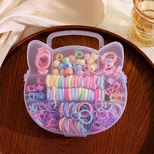 Kids hair tie set in cute cat storage box with colorful elastics and mini clips for girls.