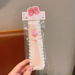 Kids lace hair bang patch detail view, pink shell decor and cute bow design for daily sweet style.
