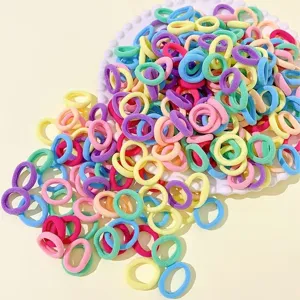Colorful mini hair ties bulk pack, vibrant elastic elastics for kids fine hair styling details.