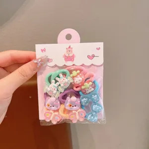 Cute cartoon hair ties set for kids, featuring sweet resin charms and soft elastic bands.