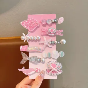 Cute pink pearl and seashell kids hair clips set, adorable mermaid hair accessories for girls.