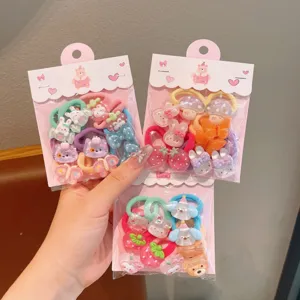 Cute kids hair ties set with resin cartoon charms, colorful elastic hair bands for girls detail view