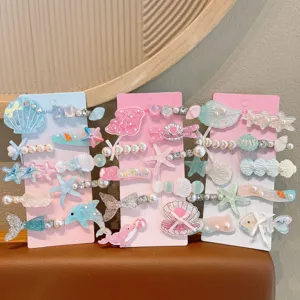 Ocean-themed mermaid pearl hair clips set for little girls, cute shell and starfish design.