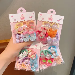 Cute children hair ties set with colorful cartoon bows, bunnies and soft elastic bands for girls.