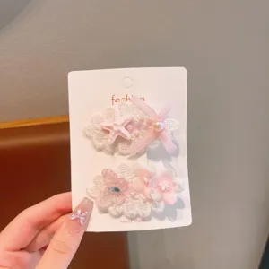 Korean sweet pink lace hair clips set for women, cute star and bow design detail view.