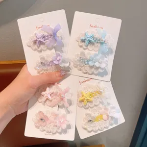 Sweet bow hair clips detail showing cute lace pearl starfish side hair clip set for women.