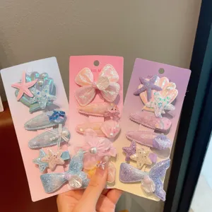Children mermaid shell hair clips set, cute ocean star hairpin detail for girls vacation.