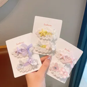 Sweet lace hair clips with pearls and butterfly design, elegant side clips for women and girls.