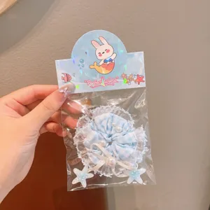 Korean style blue plaid lace hair scrunchie with pearls and star charms for women, chic hair tie.