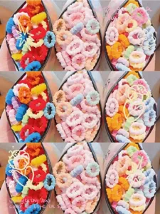 Colorful mini hair scrunchies detail view, vibrant candy colors, soft elastic hair ties.