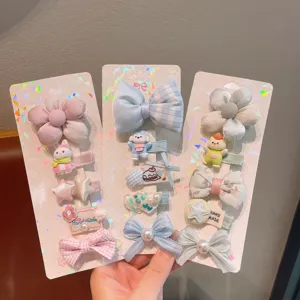 Joli ensemble de pinces à cheveux de dessin animé pour enfants, nœuds et fleurs faits main.