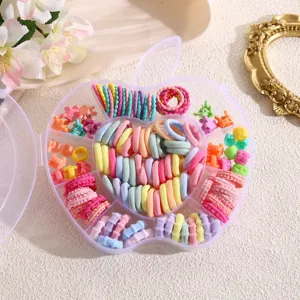 Kids hair ties set with colorful elastic rubber bands and mini clips in an apple storage box.