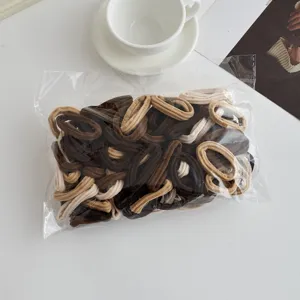 Bagged elastic hair ties set, soft daily scrunchies for women and girls in neutral tones.
