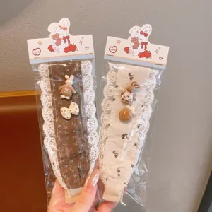 Cute lace hair band with sweet rabbit charms and magic paste for bangs. Perfect hair accessory.