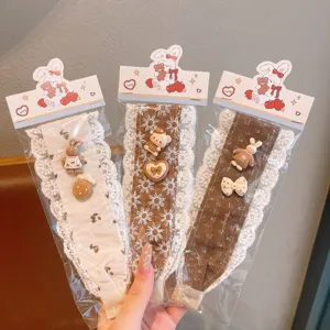Cute lace fringe hair headband detail showing sweet cartoon rabbit decor and delicate fabric trim.