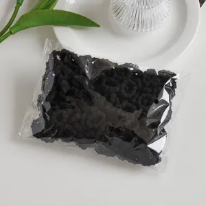 Details der 100 schwarzen Haargummis für Kinder, elastisch und aus weichem Frotteematerial.