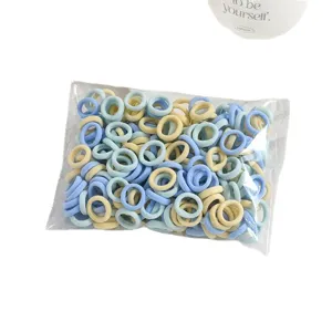 Mini 2cm elastic hair ties for kids, seamless soft towel hair bands in blue and yellow colors.