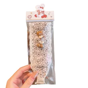 Cute lace hair band for women and kids with sweet cartoon bear and cherry charms for daily wear.