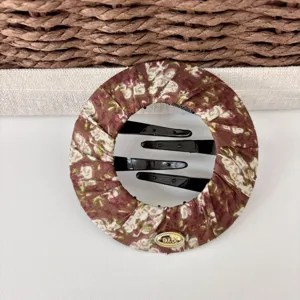 Round floral fabric hair clip bun maker with inner teeth for women and girls daily hair styling.