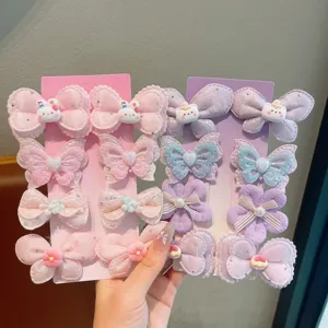 Enfants arc-en-ciel nœud pinces à cheveux mignon dessin animé accessoires pour filles.