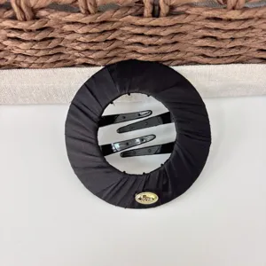 Black fabric wrapped round hair bun maker clip with inner teeth and love metal detail for women