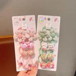 Cute floral and rabbit hair ties detail shot, sweet style hair accessories for kids girls.