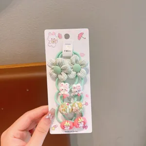 Cute children hair ties set with green plaid flowers and cute cartoon rabbit accessories.
