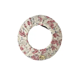 Floral hair styling ring for kids, comfortable flat donut hair maker and cute girl accessory.