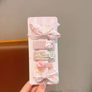 Cute kids pink hair clip set featuring sweet bows, bunny and floral designs for daily wear.