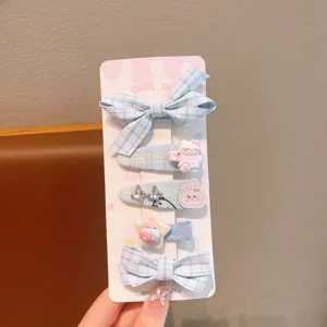 Blue plaid hair clips set for kids, cute bow and cartoon charm snap hair accessories.