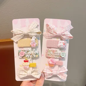 Cute kids hair clip set with sweet bows and cartoon animals, perfect for sweet daily wear.