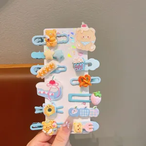 Cute dopamine hair clips set for kids, blue duckbill clips with sweet cartoon resin designs.
