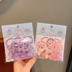 Cute cartoon hair ties detail shot, sweet style children rubber bands with lovely animal charms.