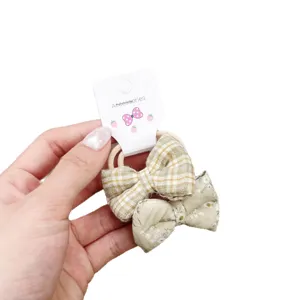 Elastici con fiocco floreale e scozzese dolce per ragazze, accessori per capelli principali.