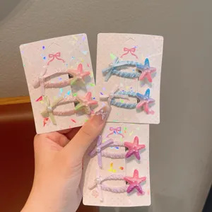 Cute starfish hair clips with bows and pearls, colorful hair accessories for kids and girls.