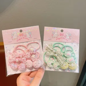 Cute cartoon bunny hair ties set with bows and pearls, perfect for kids hair accessories.