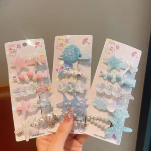 Cute summer ocean hair clips set with starfish shell dolphin and pearls for girls fashion.