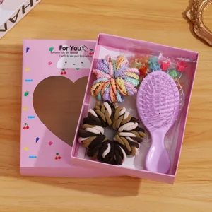 Kids hair accessories gift set with colorful hair ties, mini hair brush and cute claw clips.