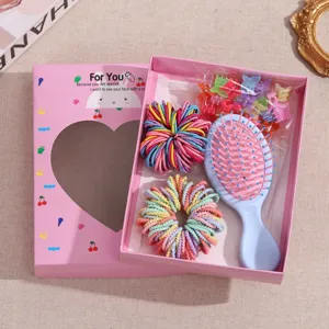 Kids colorful hair accessories set with hair ties, mini claw clips, and cute hair brush.