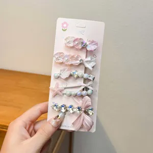 Cute dopamine hair clip set with pearls, shells, bows, and starfishes for daily chic styles.
