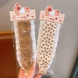 Schönes spitzenbesetztes breites Haarband mit Klettverschluss für Damen und Kinder.