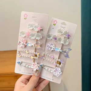 Pearl seashell starfish hair clips detail view showing cute pink sweet girl style design.